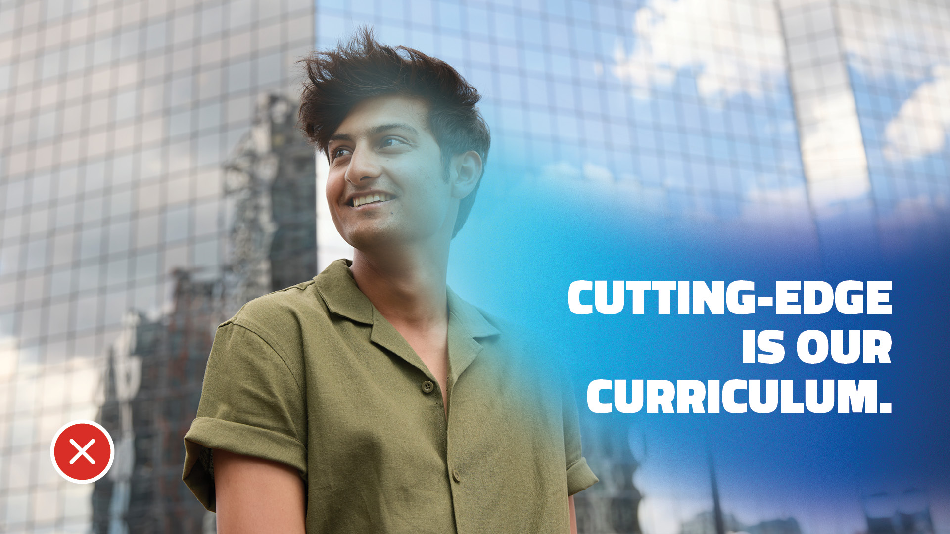 Young man smiling in front of a modern glass building, accompanied by the text "CUTTING-EDGE IS OUR CURRICULUM."