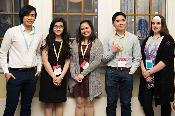 Student standing in a row after winning awards